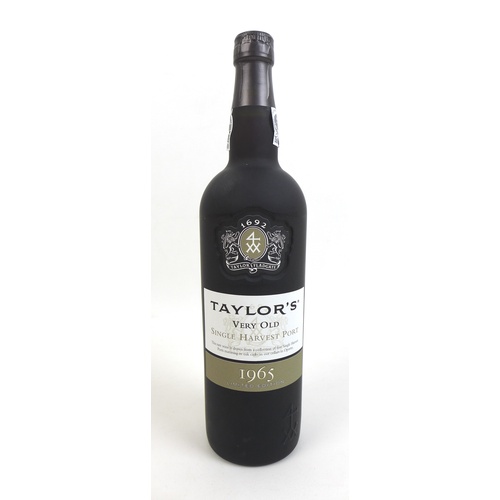 100 - A limited edition bottle of Taylor's 'Very Old Single Harvest 1965' port, with wooden presentation c... 