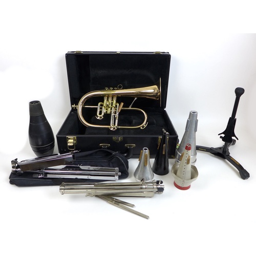 167 - A C. G. Conn Flugelhorn with Yamaha Silent Brass Flugelhorn Mute, together with fitted case, a Hercu... 