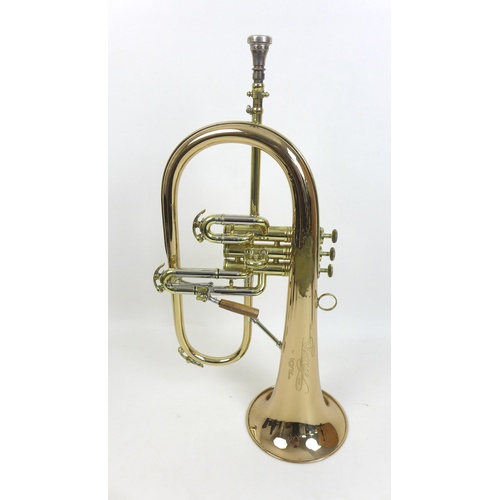 167 - A C. G. Conn Flugelhorn with Yamaha Silent Brass Flugelhorn Mute, together with fitted case, a Hercu... 