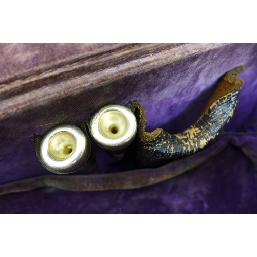 169 - A Boosey & Hawkes Ltd trumpet, with floral engraving, together with three additional mouth pieces an... 