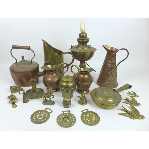 94 - A group of copper and brass items, including an electric oil lamp, a crocodile skin embossed copper ... 