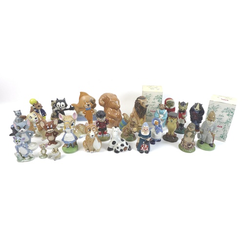 67 - A collection of Wade figurines, including a 1973 MGM Tom and Jerry set, circa 1960s Walt Disney Blow... 