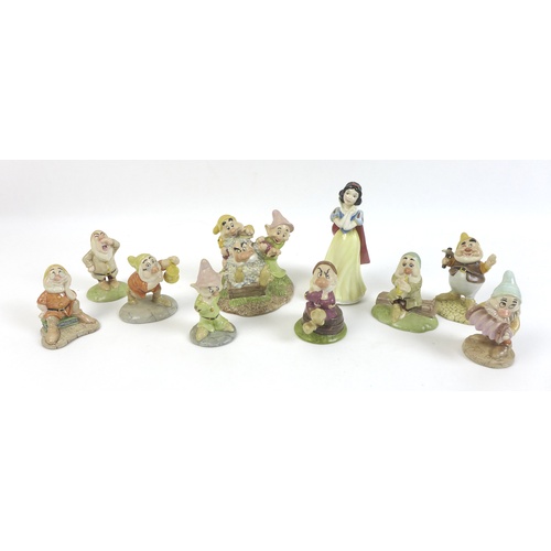 54 - A group of Beswick Snow White & the Seven Dwarf figurines, comprising Snow White SW9, Happy SW12, Gr... 