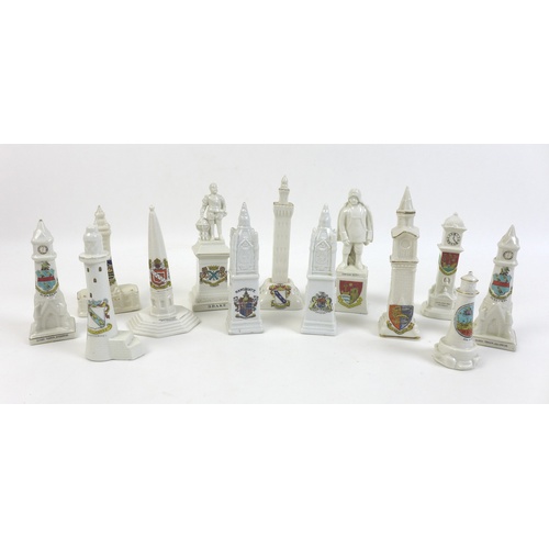 57 - A collection of crested china monuments and clock towers, including a Devonia Art China monument of ... 