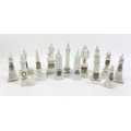 A collection of crested china monuments and clock towers, including a Devonia Art China monument of ... 