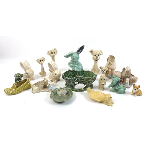 52 - A group of Slyvac figurines, including dogs, rabbits, dishes and jardinieres, tallest 20cm high. (17... 