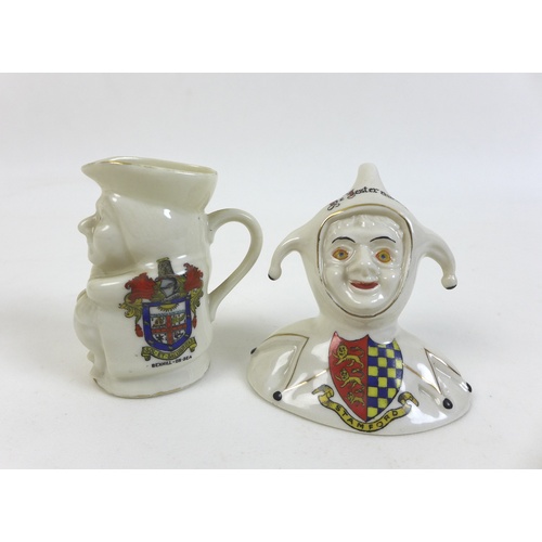 69 - A W. H. Goss Welsh Lady teapot, 14.5cm high, a/f, together with a Goss Cambridgeshire and March cres... 