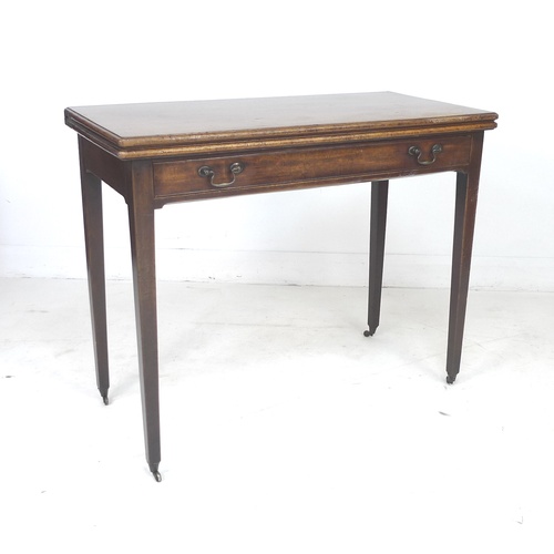 280 - A 19th century walnut tea table, with single drawer, raised upon tapering legs and brass castors, 92... 