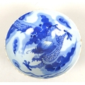 A Chinese Qing Dynasty, early 18th century, porcelain bowl, decorated in underglaze blue with a drag... 