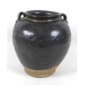 A Chinese stoneware vase with black glaze, in Song style, two small loop handles to the shoulders, 2... 