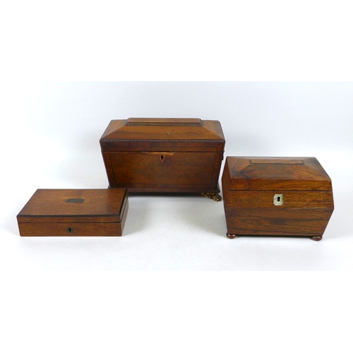 84 - A group of three 19th century wooden boxes, comprising a sarcophagus shaped tea caddy with lion's ma... 