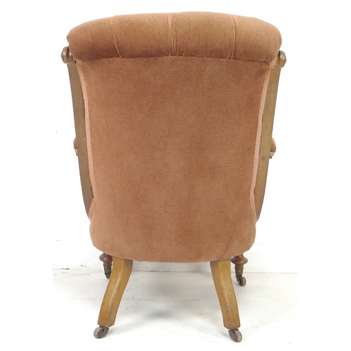 296 - A Victorian button backed mahogany framed open armchair, with brown velvet upholstered seat, back an... 