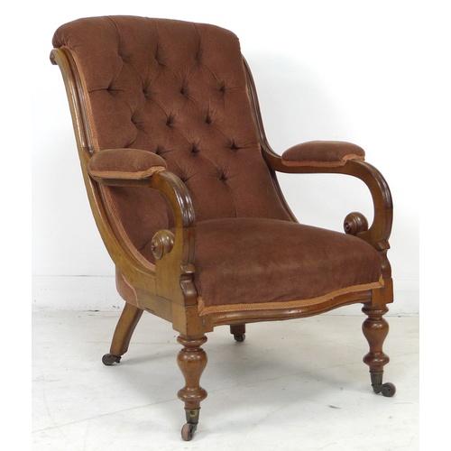 296 - A Victorian button backed mahogany framed open armchair, with brown velvet upholstered seat, back an... 