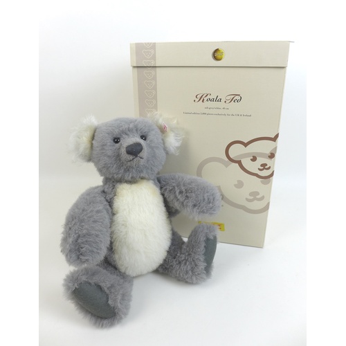 149 - A limited edition Steiff Koala teddy, in ash grey/white, edition 844/2000, with growler, 40cm high, ... 