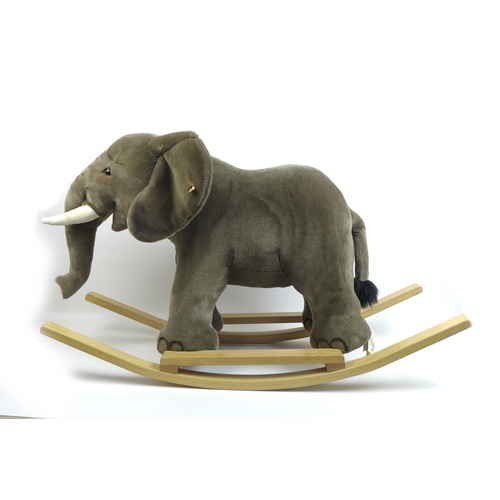 160 - A Steiff Elephant rocking toy, with wooden handles and base, without certificate, 39.5 by 108 by 65c... 