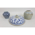 Three Chinese blue and white ceramics, comprising a 19th century porcelain circular lid with a Fo do... 