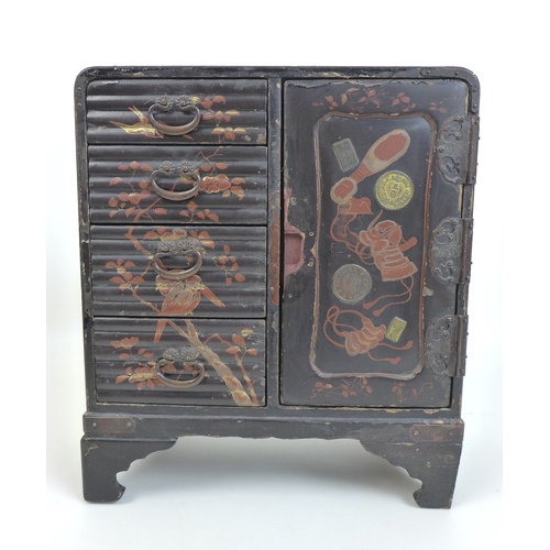 9 - A group of Japanese wooden items, comprising an early 20th century Japanned jewellery box in the sty... 