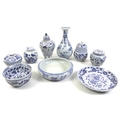 A group of modern Chinese blue and white ceramics, comprising a baluster vase with flared rim, decor... 