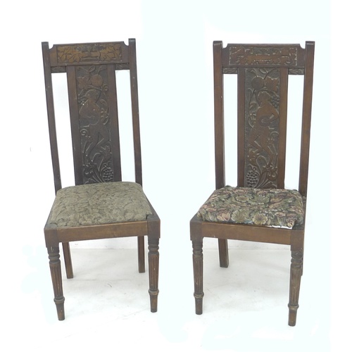 282 - An Arts and Crafts oak side chair, splat-carved with a Bacchus figure and fruiting vines, drop-in em... 