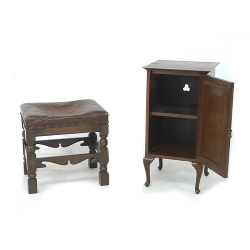 243 - A group of furniture, comprising a mahogany pot cupboard, an oak stool with faux brown leather seat,... 