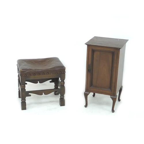 243 - A group of furniture, comprising a mahogany pot cupboard, an oak stool with faux brown leather seat,... 