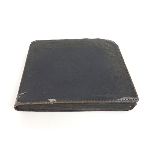 129 - A WWII photograph album containing approximately 472 images taken by Captain Edward Phillips, Offici... 