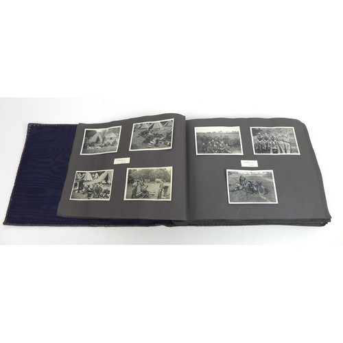 129 - A WWII photograph album containing approximately 472 images taken by Captain Edward Phillips, Offici... 