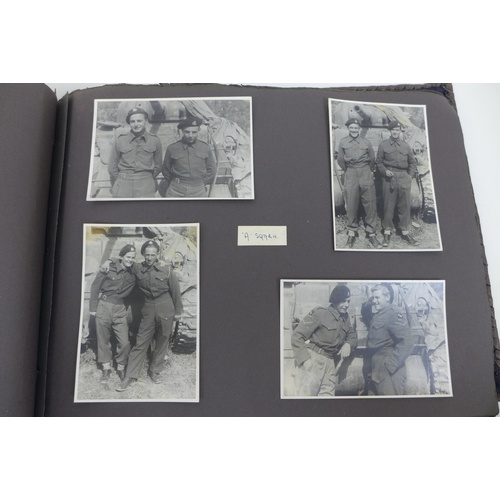 129 - A WWII photograph album containing approximately 472 images taken by Captain Edward Phillips, Offici... 