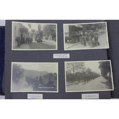 129 - A WWII photograph album containing approximately 472 images taken by Captain Edward Phillips, Offici... 