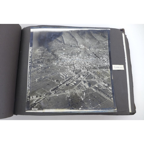 129 - A WWII photograph album containing approximately 472 images taken by Captain Edward Phillips, Offici... 