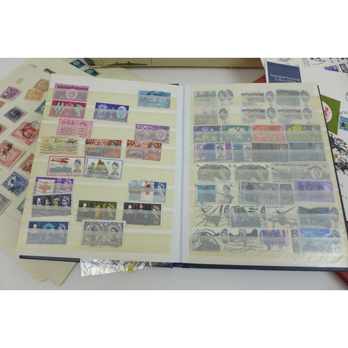 137 - A collection of stamps and first day covers, including some mint and unused British stamps, a WWII t... 