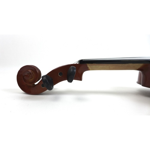 175 - An Antoni ACV30 violin with two bows and a fitted case. (4)