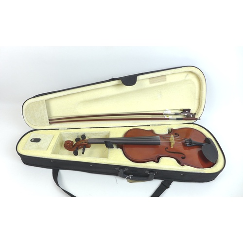 175 - An Antoni ACV30 violin with two bows and a fitted case. (4)