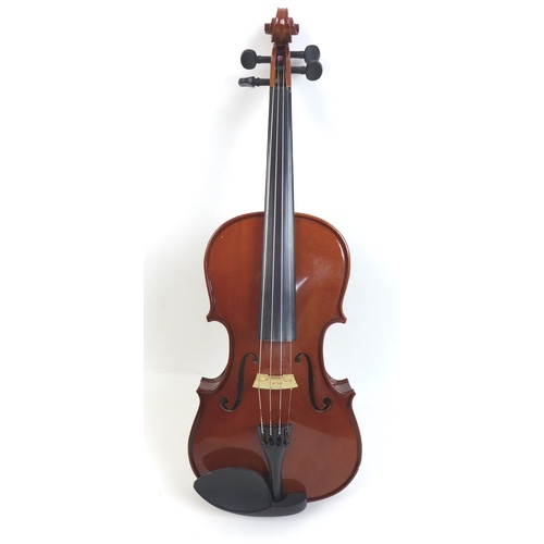 175 - An Antoni ACV30 violin with two bows and a fitted case. (4)