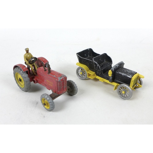 161 - A collection of eleven playworn vintage model vehicles, comprising a Dinky Massey harris tractor, a ... 