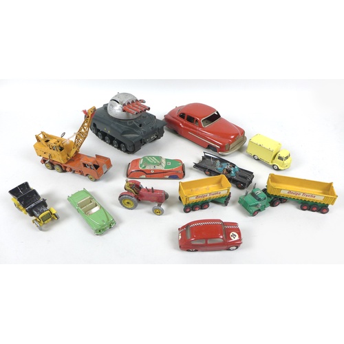 161 - A collection of eleven playworn vintage model vehicles, comprising a Dinky Massey harris tractor, a ... 