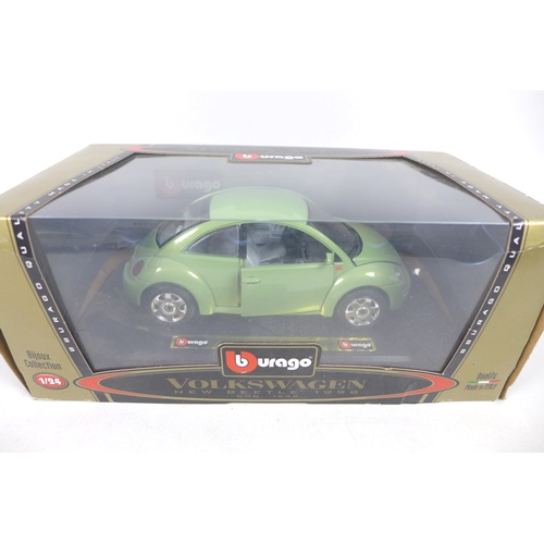 165 - A collection of six model cars, comprising Franklin Mint 1:24, 1967 Volkswagen Beetle in grey, The V... 