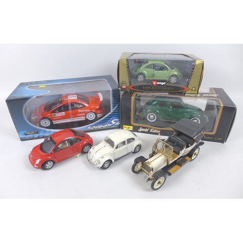 165 - A collection of six model cars, comprising Franklin Mint 1:24, 1967 Volkswagen Beetle in grey, The V... 