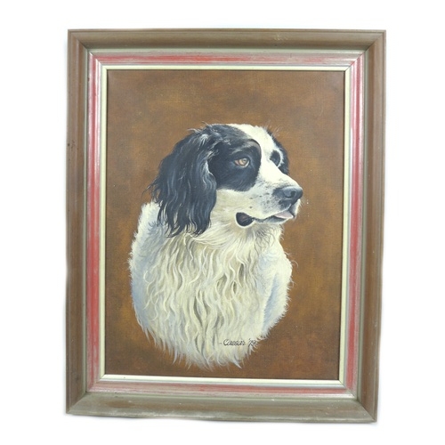 215 - J. Caesar Smith (British, b. 1930): a canine portrait of a black and white spaniel signed 'Caesar '7... 