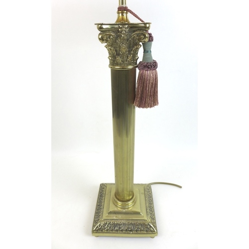 85 - An early 20th century brass table lamp in the form of a Corinthian column, with square form base, 17... 