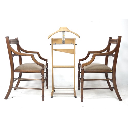 266 - A pair of Edwardian mahogany open armchairs, in the style of Gillows, with line carved frames, drop ... 