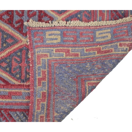 231 - A Gazak rug with diamond pattern field, 125 by 115cm.