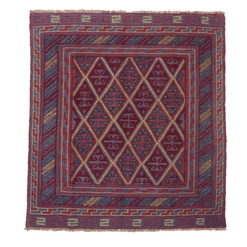 231 - A Gazak rug with diamond pattern field, 125 by 115cm.