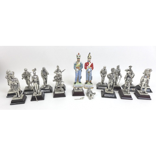 113 - A collection of white metal soldier figurines, including different regiments and periods of uniform,... 