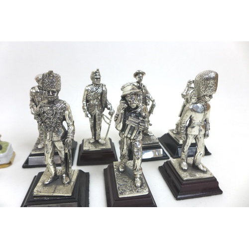 113 - A collection of white metal soldier figurines, including different regiments and periods of uniform,... 