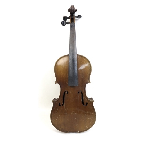 172 - An early 20th century violin, and a 19th century walnut violin coffin case, together with three viol... 