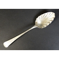 A George III silver serving spoon, with scalloped bowl and engraved decoration to handle, Christophe... 
