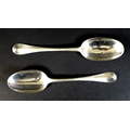 Two George I silver Hanoverian rat tail pattern tablespoons, comprising one by Phillip Roker II, Lon... 