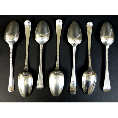 50 - A collection of seven George III silver tablespoons, comprising two with transitional rat tail backs... 