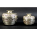 Two Cambodian Khmer silver pomegranate shaped boxes, likely late 19th or early 20th century, both ch... 